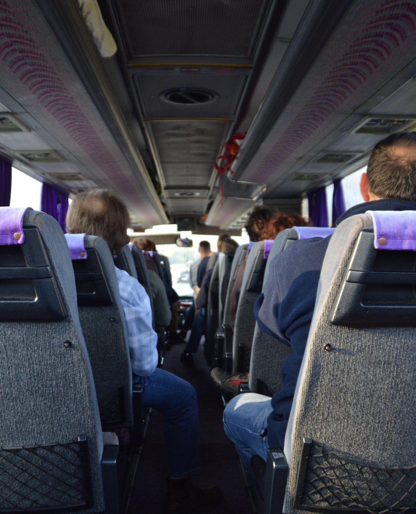 rear-view-of-passengers-on-the-bus.jpg